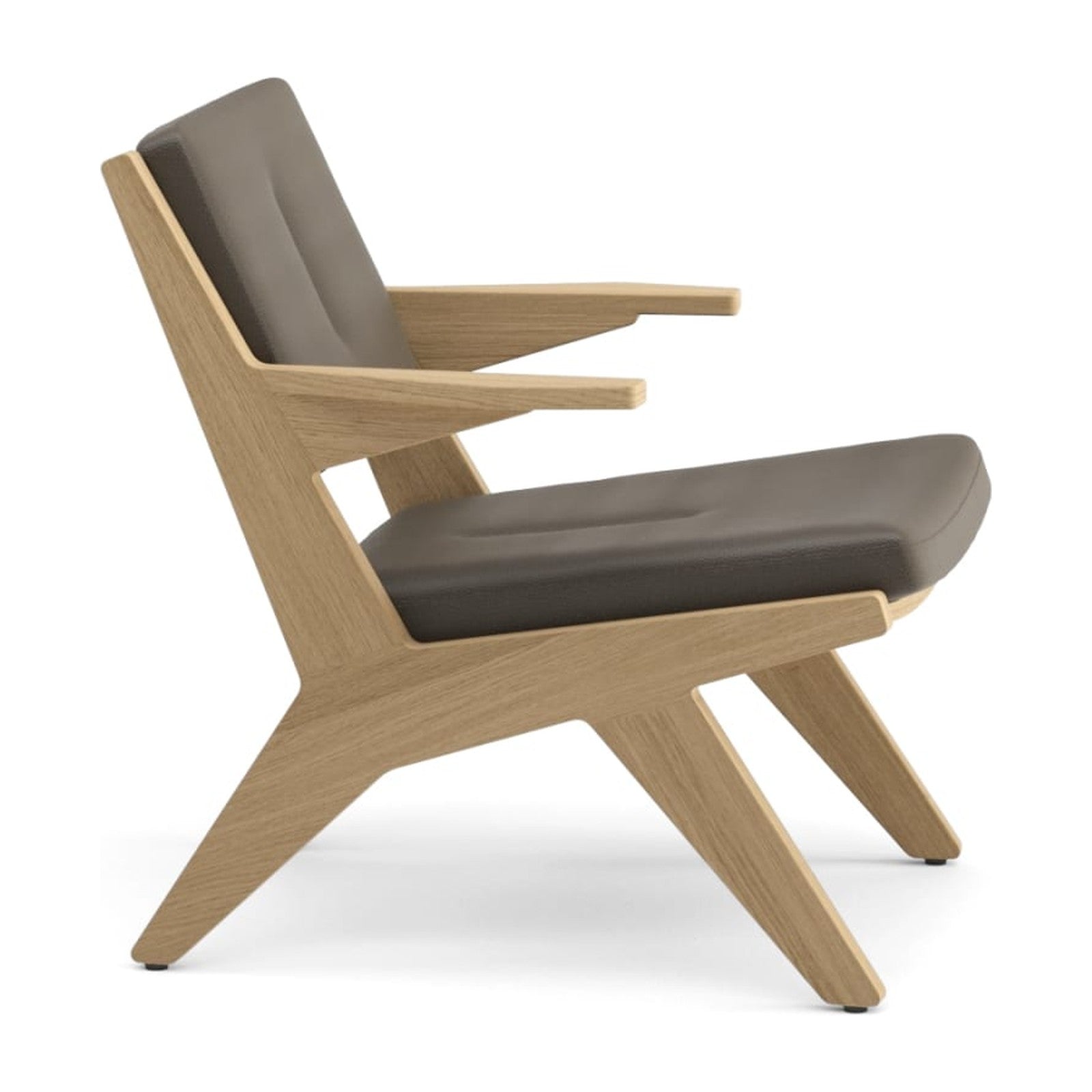 Toggle Lounge-Sessel von Prostoria, freigestellt vor weissem Hintergrund, Seitenansicht.