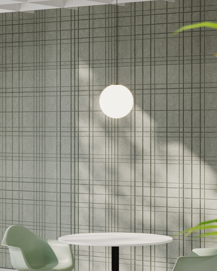 Wandverkleidung Plaid – Akustische Wandverkleidung – Grüne Wand mit kariertem Muster und hängender runder Lampe. Weißer Tisch und grüne Stühle im Vordergrund.