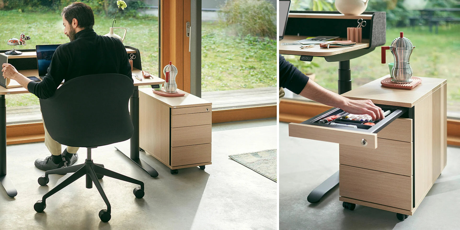 Schmalcontainer – Stand- und Rollcontainer – Moderner Bürotisch mit schwarzem Bürostuhl, Holzrollcontainer und Pflanzen im Hintergrund. Schublade wird geöffnet.