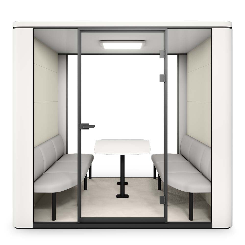 se:cube L – Meetingbox – Glasbox mit zwei grauen Bänken und einem Tisch in der Mitte, helle Wände, Deckenbeleuchtung.